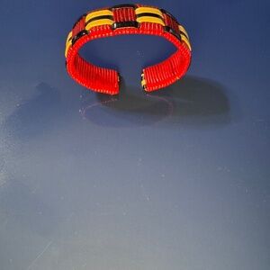 Red, yellow and black woven bracelet